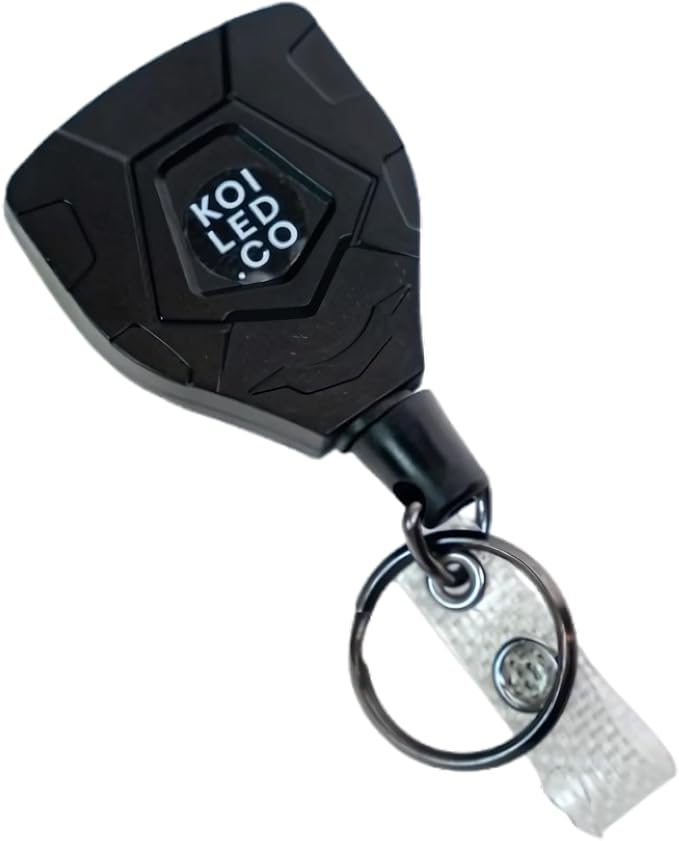 Retractable keychain with belt clip holding car keys